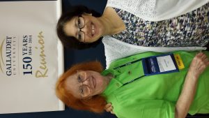 The picture was taken at Gallaudet University 150th year reunion in Washington, DC.  We chatted. She shared her memories with me what she was doing during her studies at University.  She was in the play and showed me pictures of who and who.  I had fun with her. Helena Ngalle